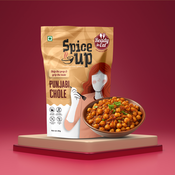Spice mix package labeled 'Punjabi Chole' with a bowl of chole on a red background