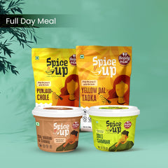 An advertisement for Spice Up brand showing four packages labeled as Full Day Meal. The packages are for different dishes: Punjabi Chole, Yellow Dal Tadka, Dal Makhni & Chawal, and Idli Sambar.